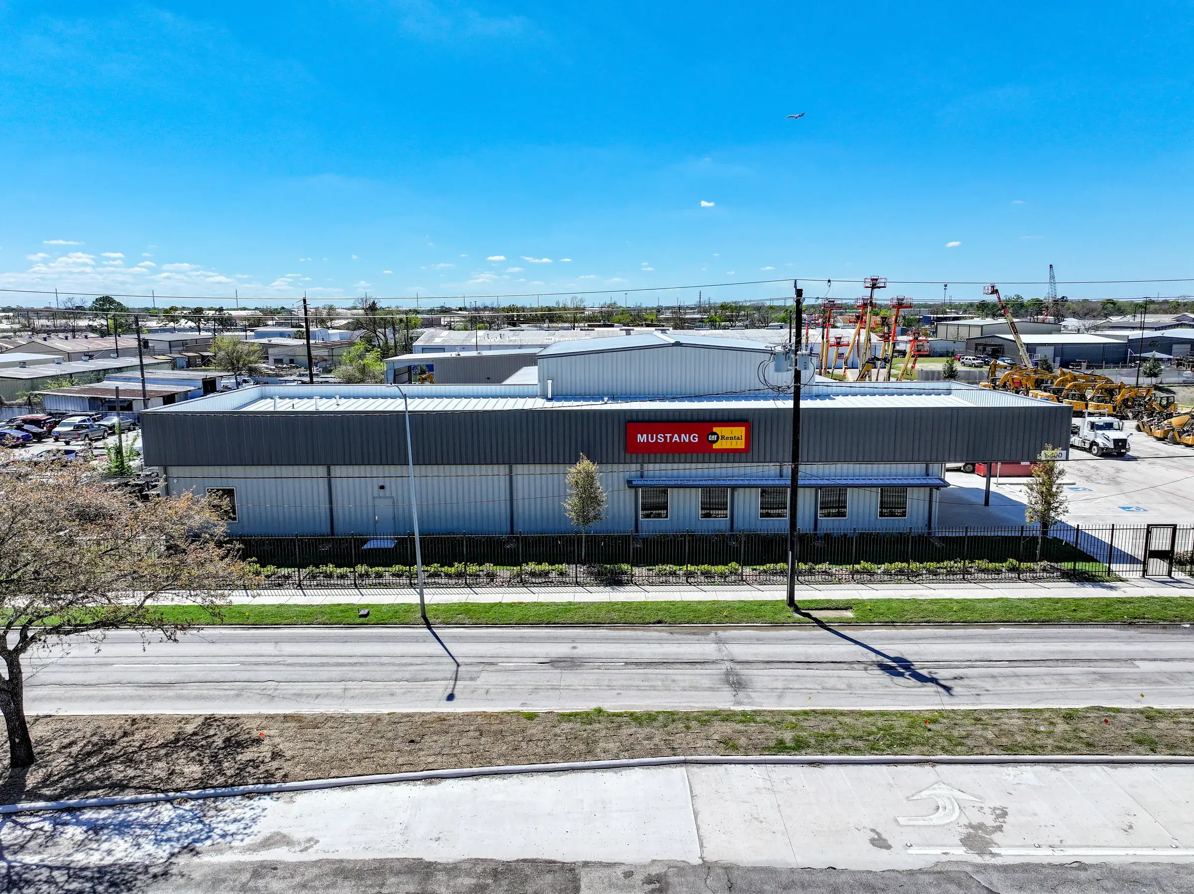 The Mustang CAT facility along its street frontage with the branded sign